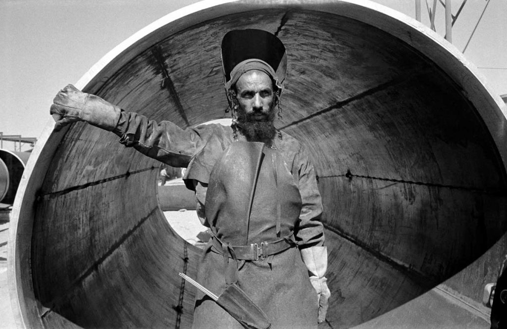 Yemenite welder and Pipeline. 1954.