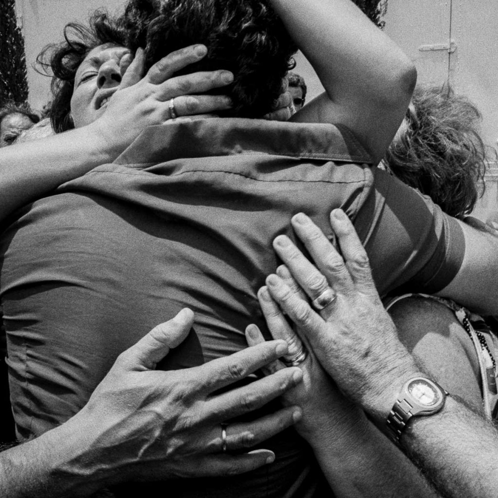 Freed hostages return from Entebbe reunited with their families at Ben-Gurion airport. 1976.
